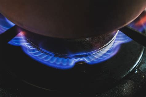 gas stove clicking after water spill